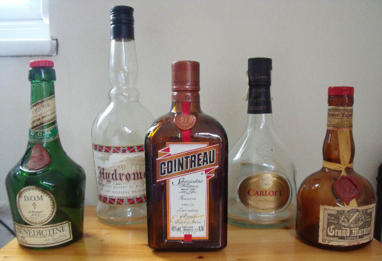 4 empty spirit bottles: Hydromel, Carlos I,Cointreau,Benedictine.Grand Marnier SOLD! £1.50 ea