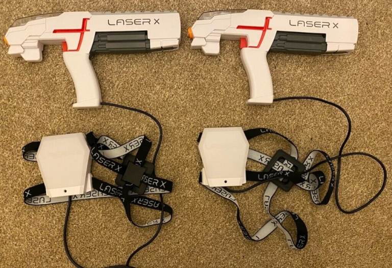 Laser X, two controllers and pads in excellent condition
