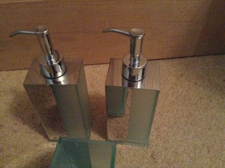 Bathroom, washbasin set two soap dispensers, one toothbrush holder, used for show
