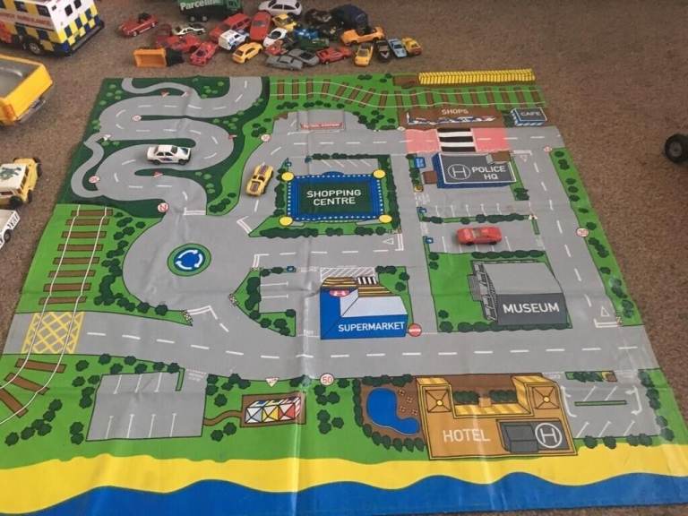 Childs play mat and car collection, tractor vintage, ambulance battery operated