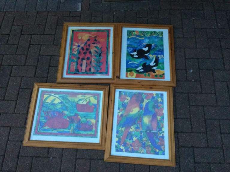 Four Animal signed large framed prints by Lisa V Kearney in pine frames.