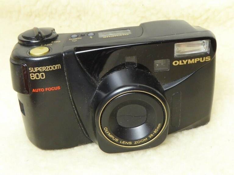 OLYMPUS Superzoom 800, Auto Focus. Lens Zoom 38-80mm