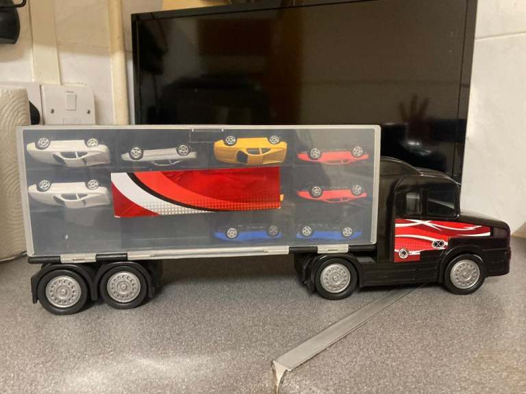 Car transporter lorry and cars