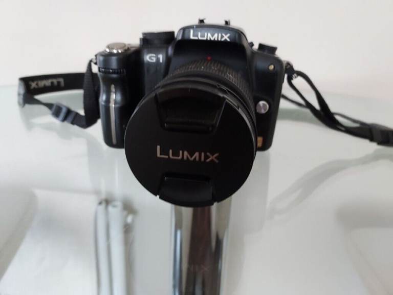 Panasonic Lumix DMC-G1 12.1MP Digital Camera with Lumix G Vario 14-45mm/F3.5-5.6 Lens and filters