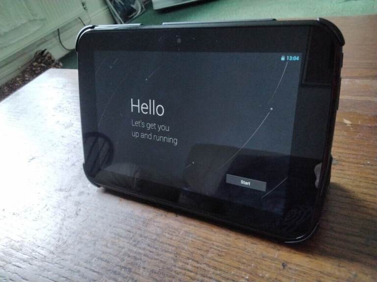 Tesco Hudl HT7B16S3 Android Tablet 16Gb AND Case AND Charger. 19cm by 13cm. FOR PARTS