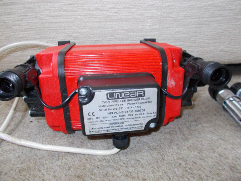 Twin entry shower pump
