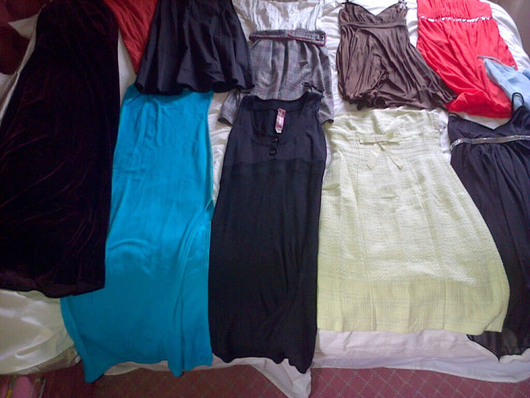 collection of Ladies clothes-  party/summer dresses, suits, etc. Sizes 8 & 10, some new with tags,