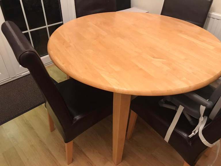 Wooden dining table + 4 chairs