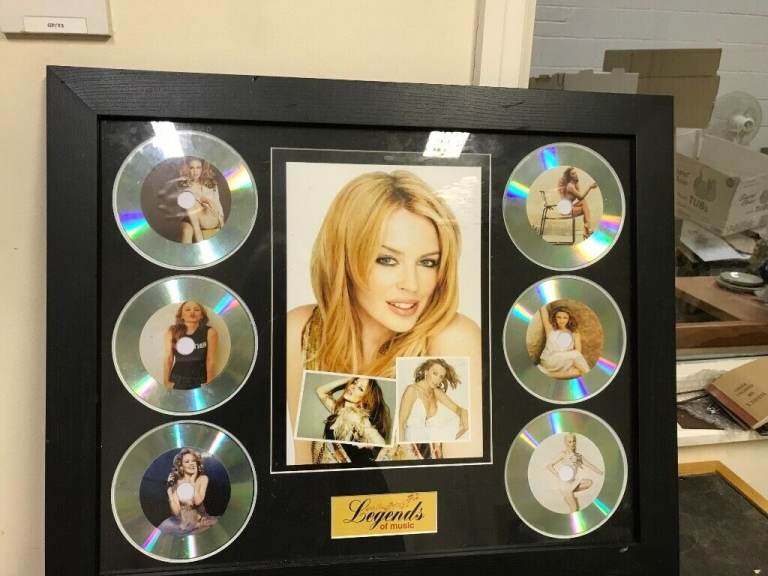 KYLIE MINOGUE LEGENDS OF MUSIC CD AND PRINT IN BLACK FRAME