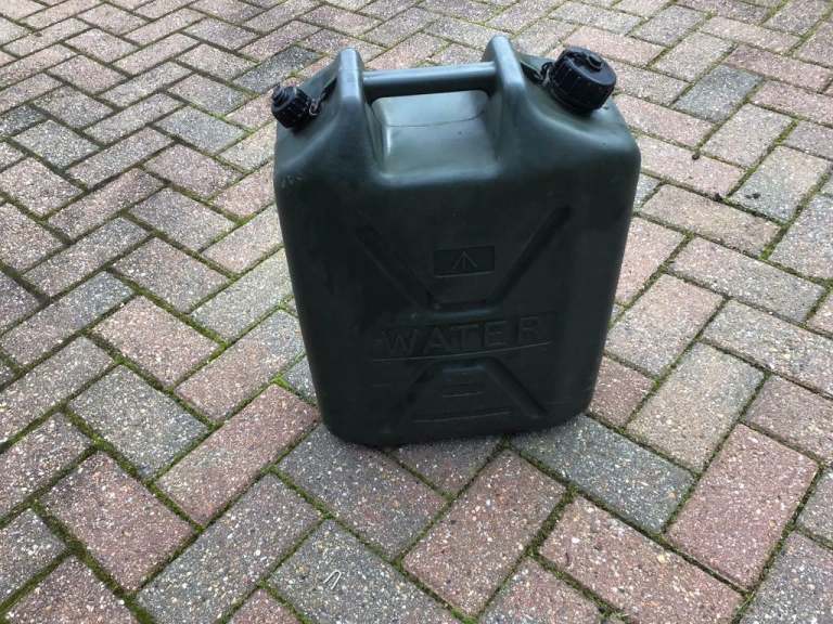 4 Gallon dark green  water container.