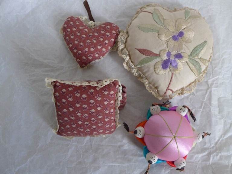 Collectable: Four vintage pin cushions wall hangings. Three as new and unused. £30 for all four.