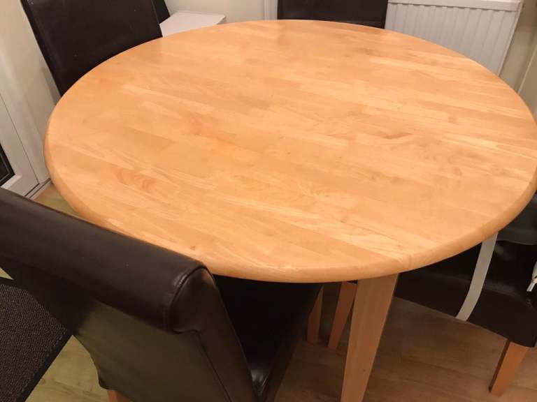 Wooden dining table + 4 chairs