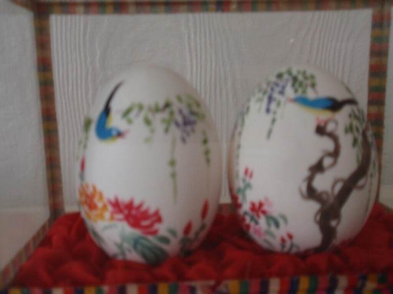 Set of two Chinese style painted eggs in display box
