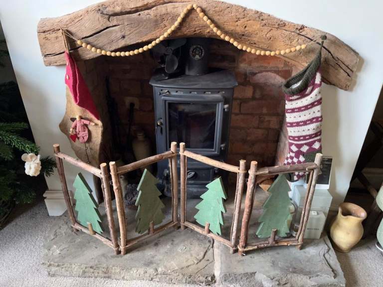 Festive rustic wooden folding fire guard, Christmas tree decoration