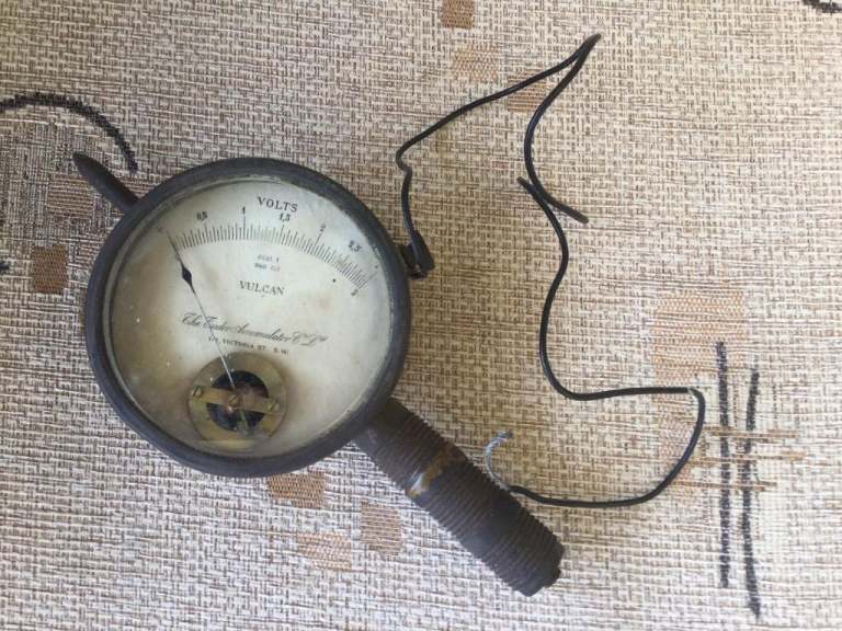 Hand-held old Voltmeter