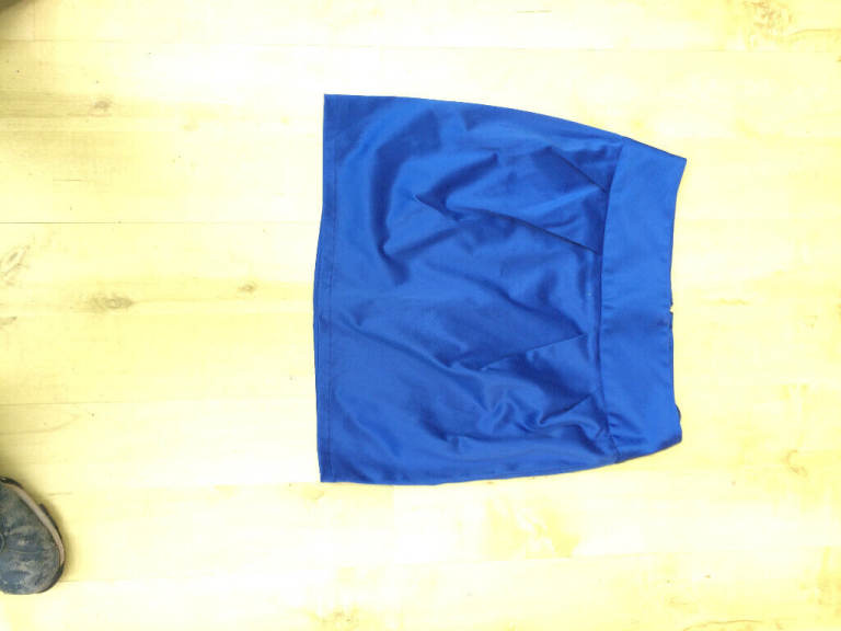 NEW Beautiful silk like designer  , mini skirt size 8, never worn