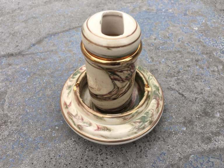 Cigarette lighter holder and matching ashtray (collectors item).