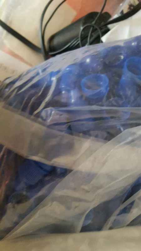 2000 (approximately) transparent empty squeezable dropper bottles.