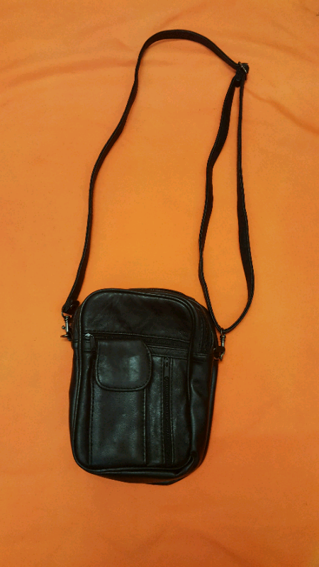 Leather pouch with 7 compartments and adjustable strap BRAND NEW.