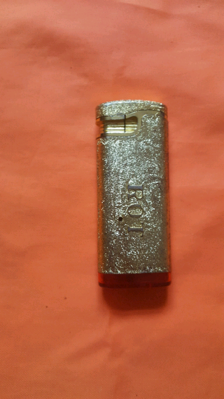 Refillable Musical cigarette lighter (BRAND NEW).