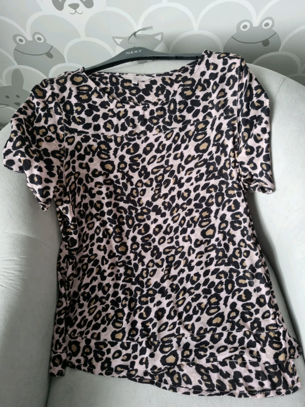 Ladies pale pink leopard print top.