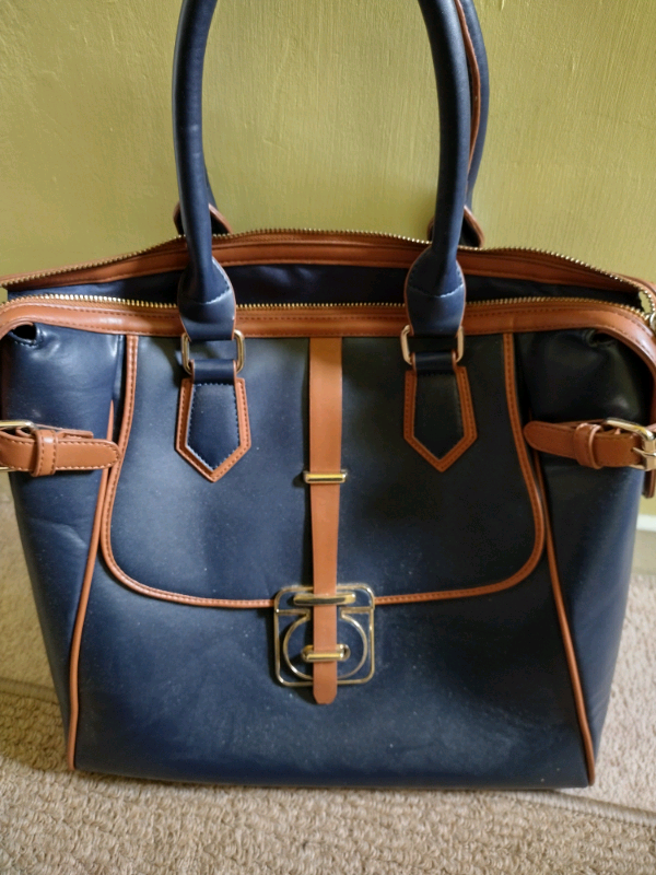 Accessorize large bag as new