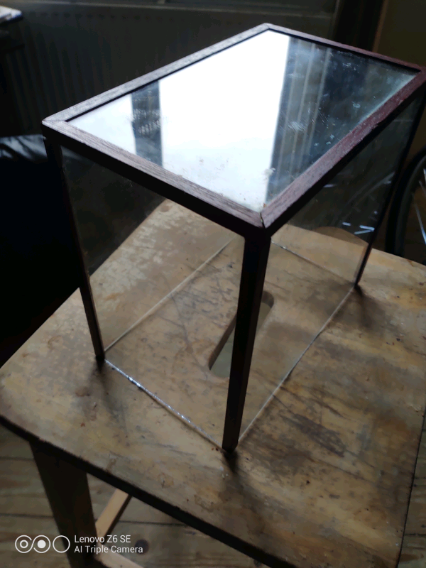Glass dust cover made out of wood
