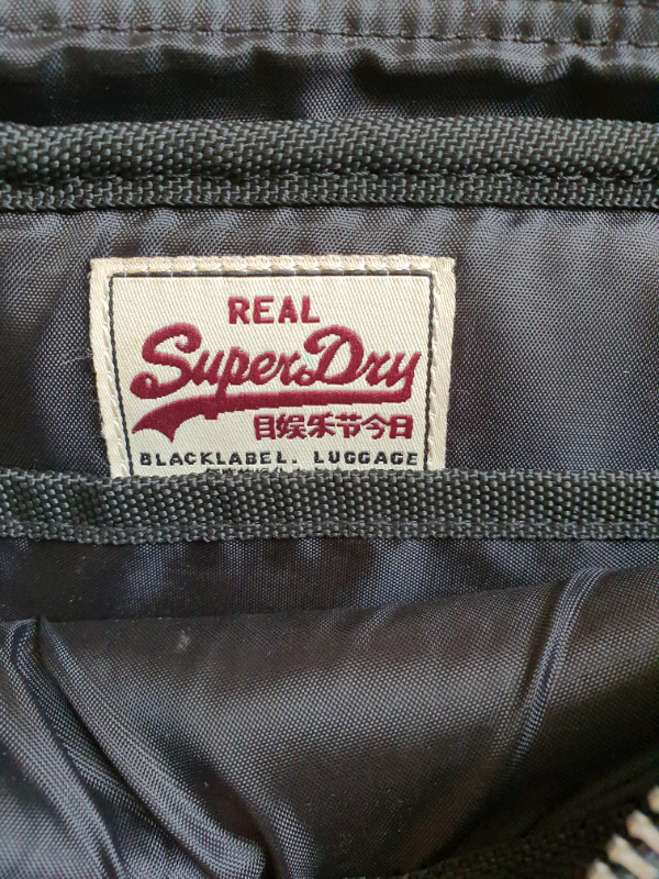 Superdry sequin bag unused.