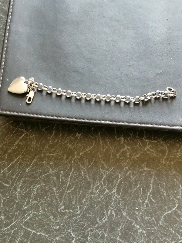 Beautiful ladies bracelet nice Chucky with a heart. 