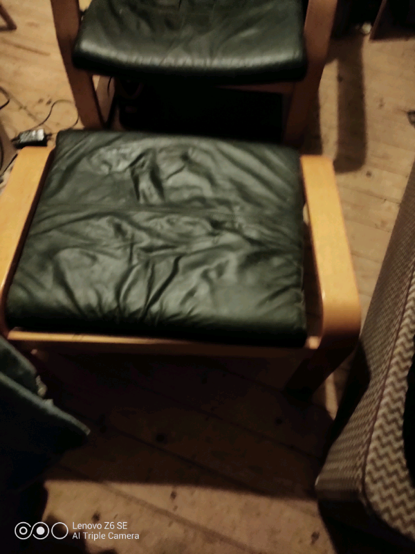 IKEA black armchair and footstool