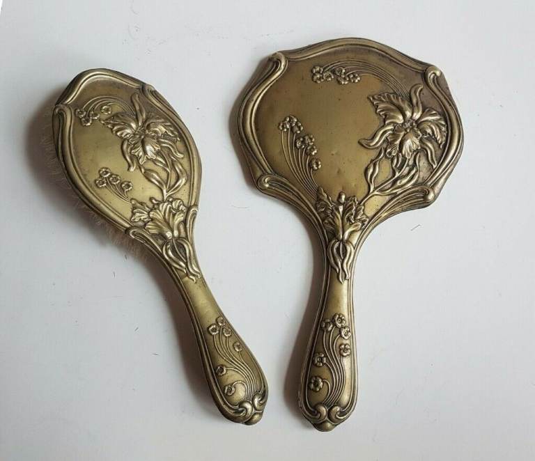 Antique Art Nouveau hand brush and mirror, made from brass, around 1900