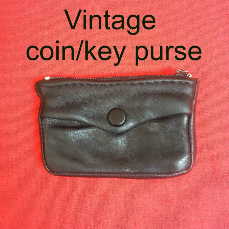 	Vintage black leather coin/5 keys purse. Happy to post.