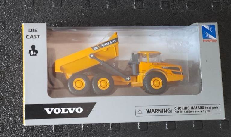 New Volvo Die Cast Dump Truck earth mover Toy as new condition.