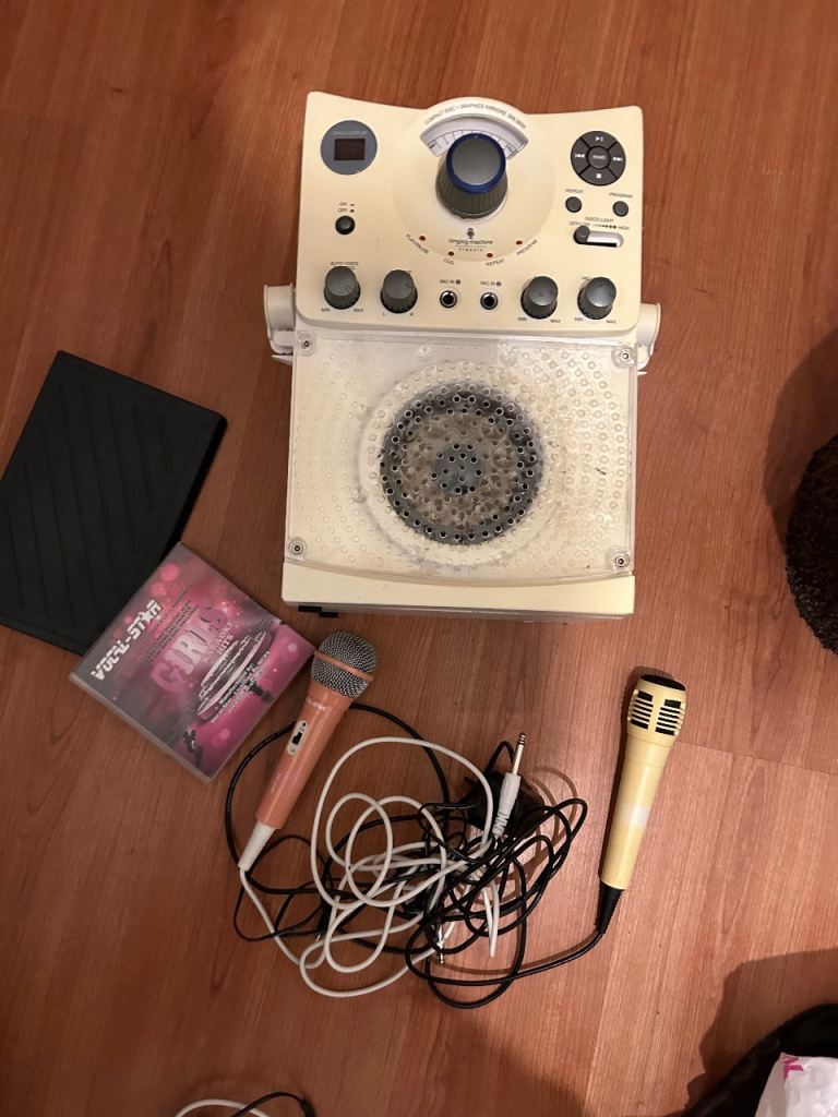 Karaoke machine with mics and cd