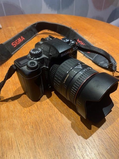 Sigma SA7 film SLR camera.