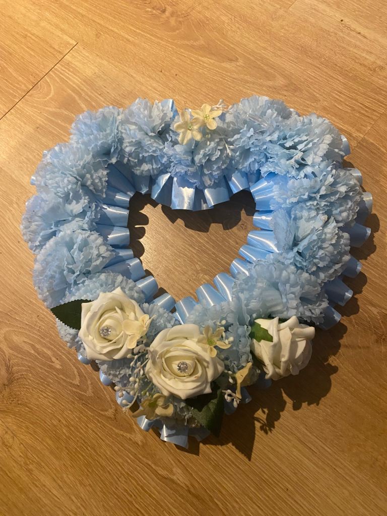 Silk flower wreath 12 x12 inchs. Message card and holder included 