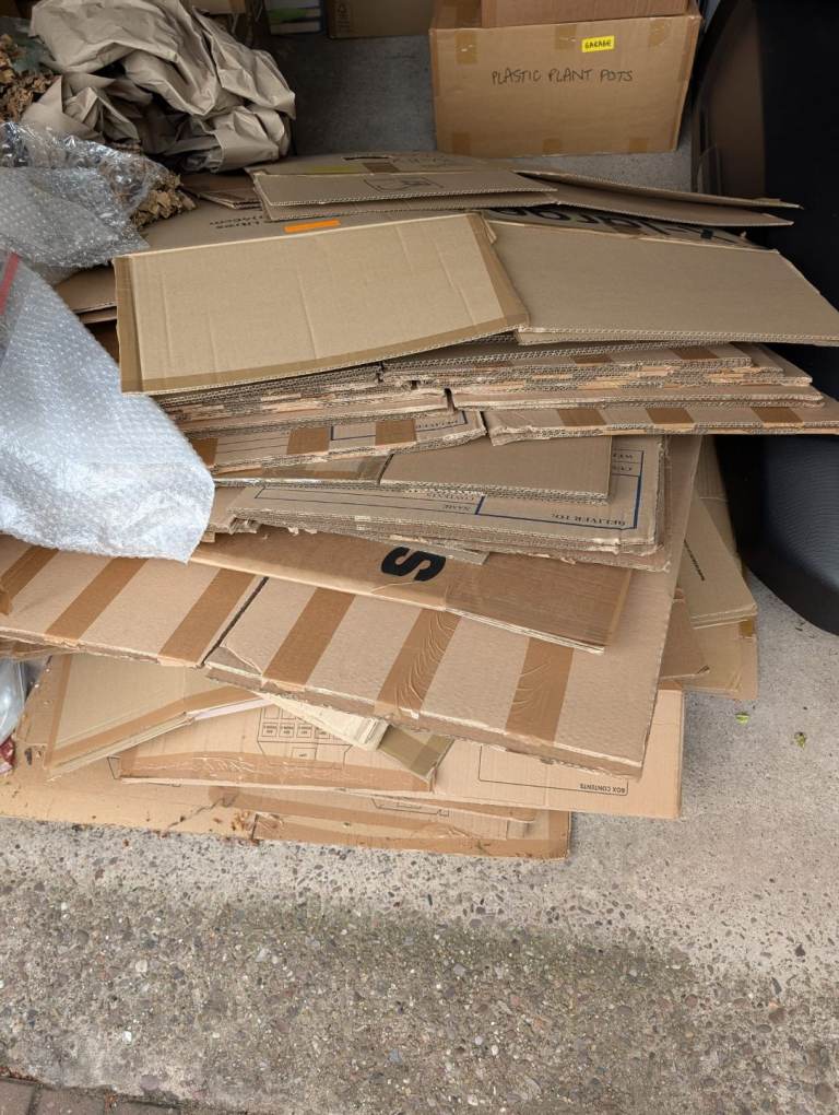 House move kit of used cardboard boxes and packaging