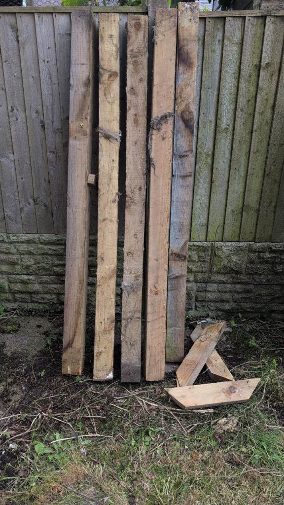 5 4"x4" six foot high fence posts
