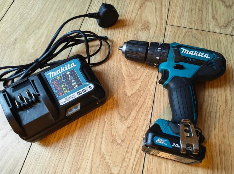 Makita HP333D 12V CXT Li-Ion Combi Hammer Drill Driver with 2Ah Battery & Charger