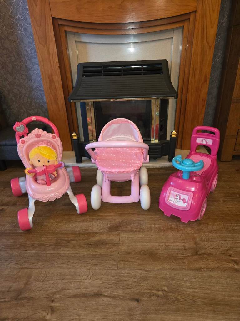 Toy prams and car.