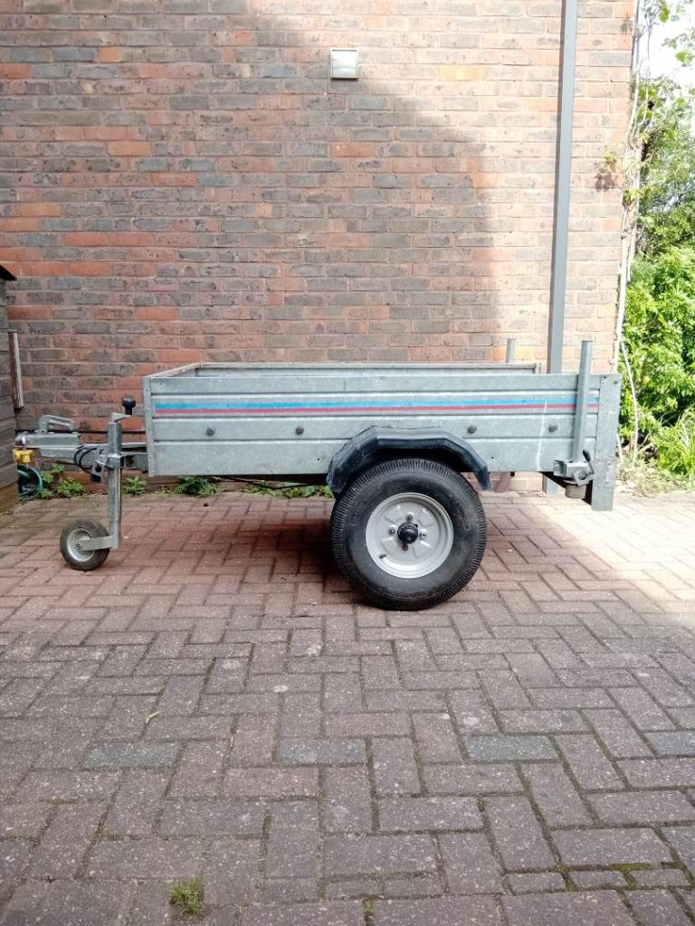 Small box trailer with wheel lock & hitch lock.