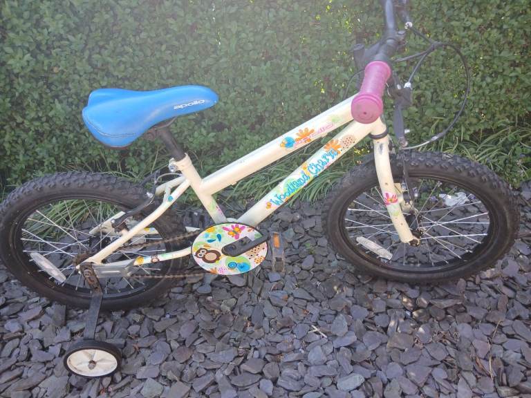 Leeds 15. £30 no offers, thanks.  Apollo Woodland Charm kids bike with stabilisers 18 inch wheels 