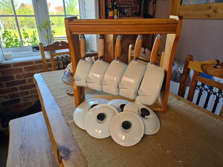 Le Creuset saucepan set with hanging rack