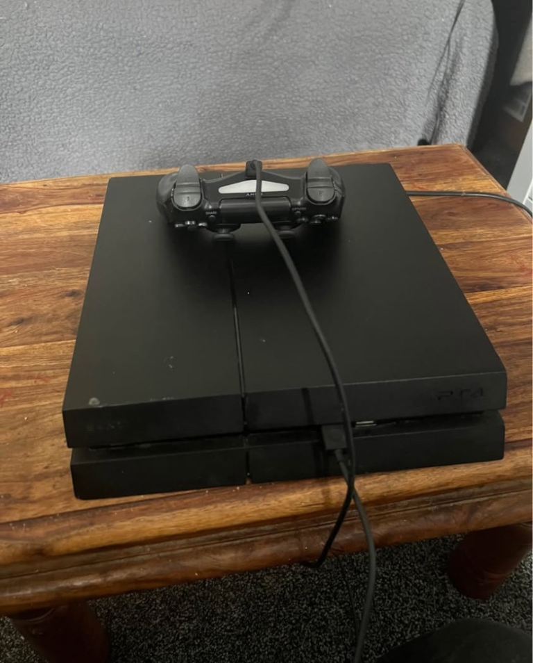 Sony PlayStation 4 Console & Controller with Games