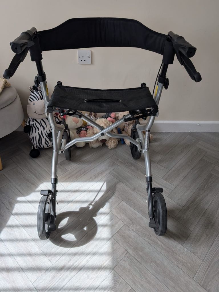 Rollator  with Seat and Brakes – Good Condition