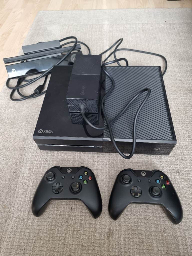 Microsoft Xbox One Console + two controllers