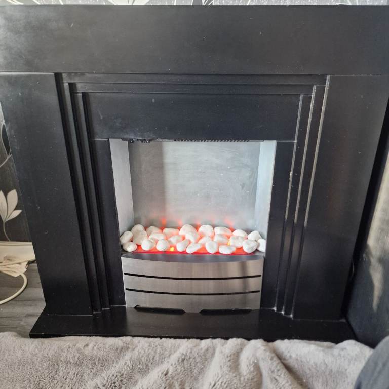 Electric fire with built in bluetooth speakers