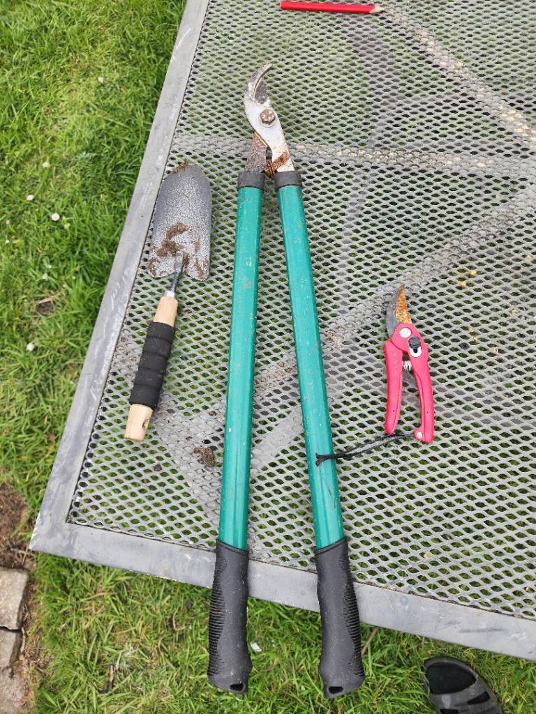 Used assortment of garden tools
