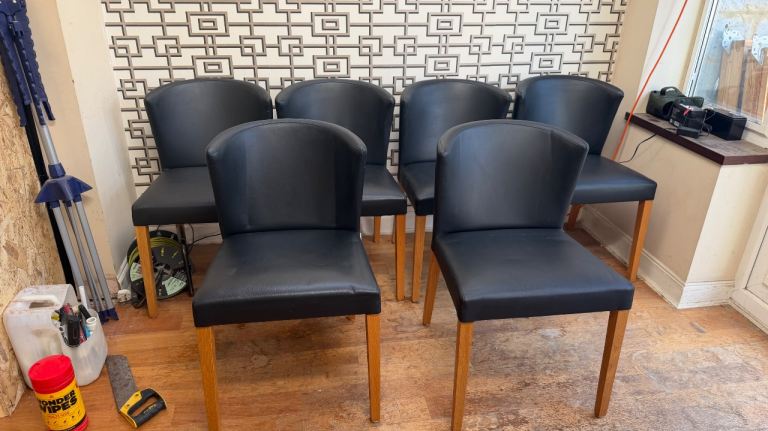 6 faux leather Habitat dining chairs with solid oak legs 