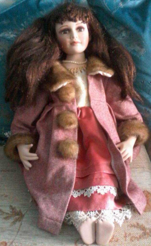 THE PORCELAIN DOLL COLLECTION